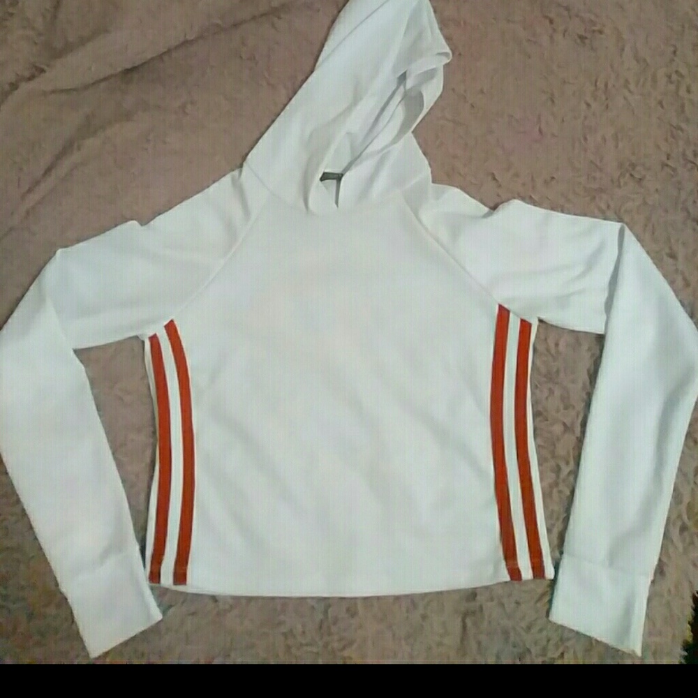 White crop top with red stripes on the sides